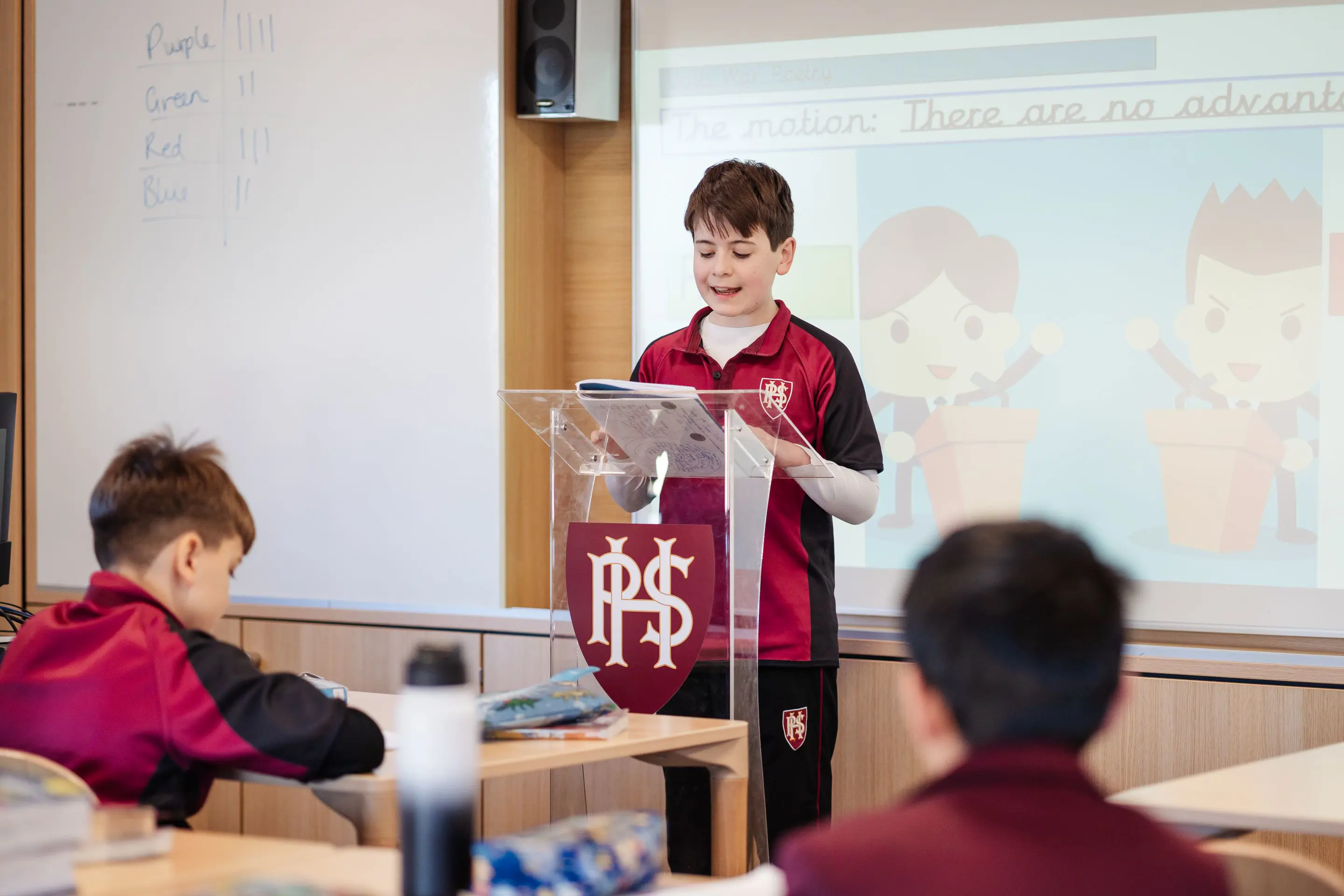 Student giving his peers a presentation in lesson at Homefield Prep