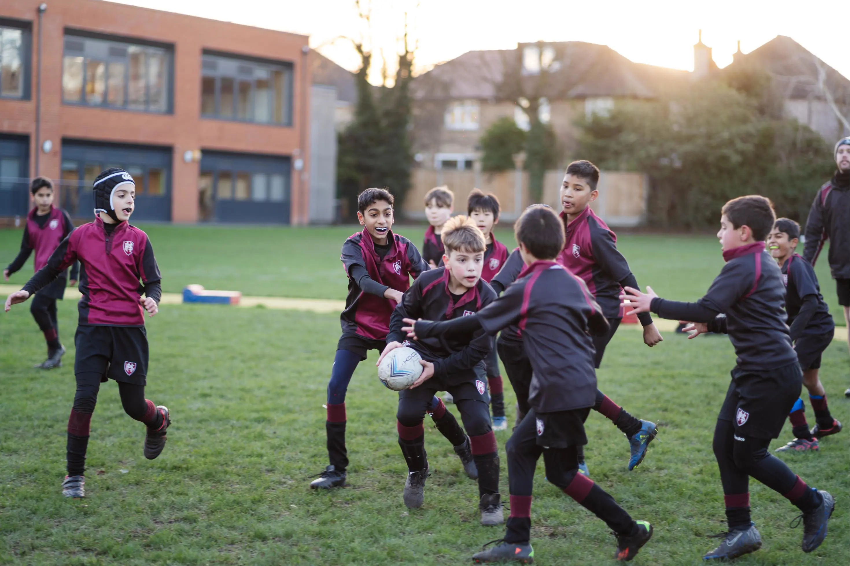 Boys playing Rugby on the sports field at Homefield Prep